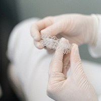 Dentist discussing clear aligners with patient