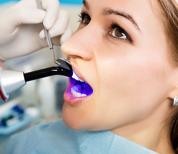 Patient receiving cosmetic dental bonding treatment