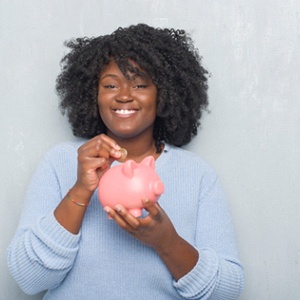 Woman with piggy bank in Naperville