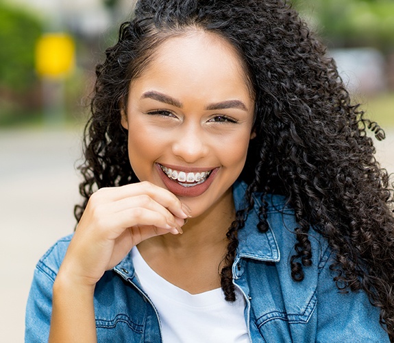 Woman with tooth colored braces