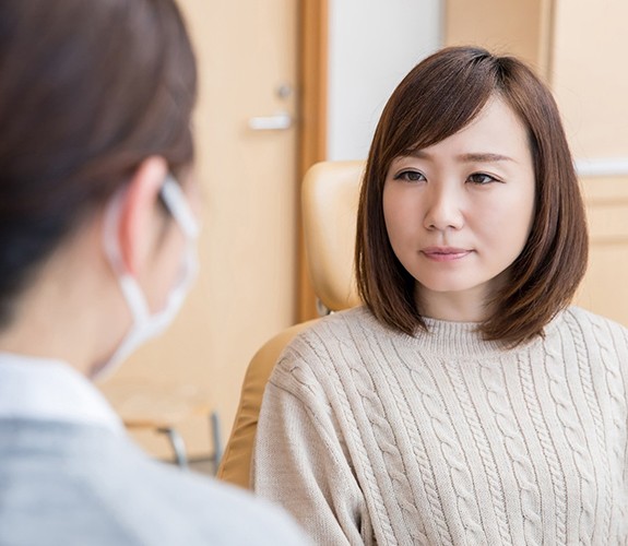 Women learning gum disease in Naperville