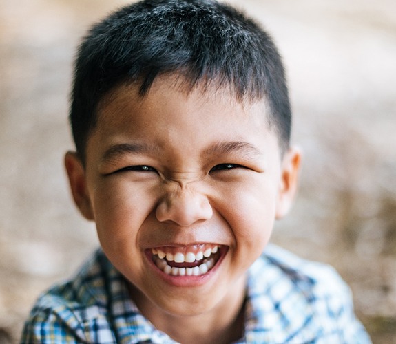 Boy smiling after Phase 1 orthodontics in Naperville, IL