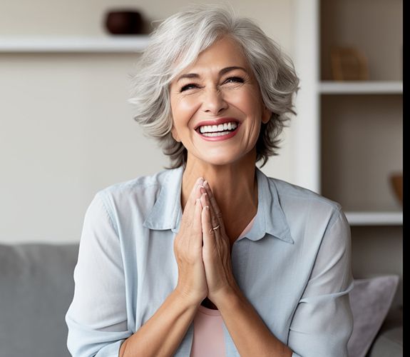 Woman with brighter teeth sitting on couch