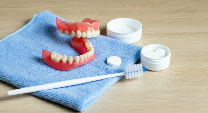 full dentures and cleaning materials